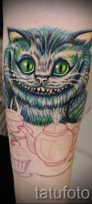 Cheshire -i macska tetoválás fotója a tetoválás tervezéséről szóló cikkhez - tatufoto.ru - 51