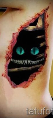 Cheshire -i macska tetoválás fotója a tetoválás tervezéséről szóló cikkhez - tatufoto.ru - 16