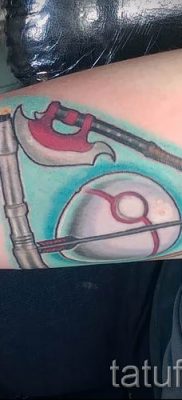 Снимка на татуировка на татуировка на дари на смърт за статия за значението на дизайна на татуировка - tatufoto.ru - 29