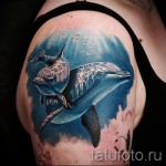 وشم دولفين في أعماق المحيط - عمل فني واقعي