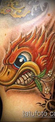 fotó egy harkály tetoválásról (jelentése) - egy példa egy érdekes tetoválási tervre - 007