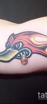 fotó egy harkálytetoválásról (jelentése) - példa egy érdekes tetoválási rajzra - 005
