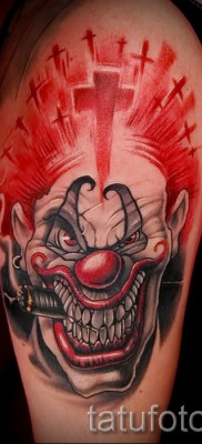 снимка пример за татуировка жокер с пура и кръст - татуировка на рамото