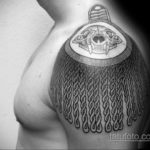 fotó epaulet tetoválásról a vállon (vállpánt) 2019.12.12.