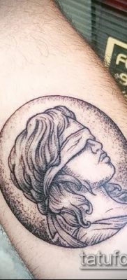 fotó Themis tetoválásról (jelentése) - példa egy érdekes tetoválási tervre - 039