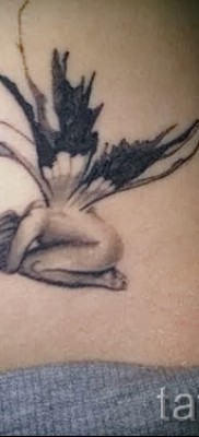 Tündér tetoválás rákkal - alsó has tetoválás