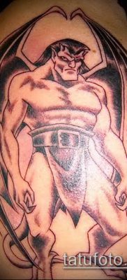 Fotó egy vízköpő tetoválásról (jelentése) - példa egy érdekes tetoválási tervre - 045