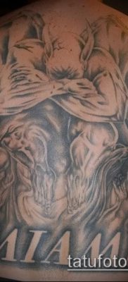 Fotó egy vízköpő tetoválásról (jelentése) - példa egy érdekes tetoválási tervre - 039