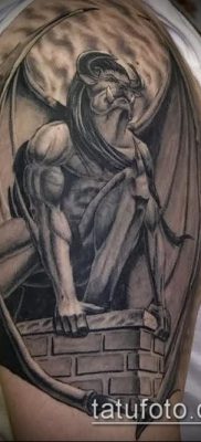 Fotó egy vízköpő tetoválásról (jelentése) - példa egy érdekes tetoválási rajzra - 007