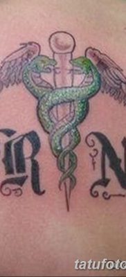 fotó a Caduceus tetoválásról, kelt 2017.10.21 -én №032 - Caduceus tetoválás -