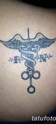 fotó a Caduceus tetoválásról, kelt 2017.10.21 -én №034 - Caduceus tetoválás -