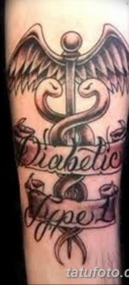 fotó a Caduceus tetoválásról, kelt 2017.10.21. №059 - Caduceus tetoválás -