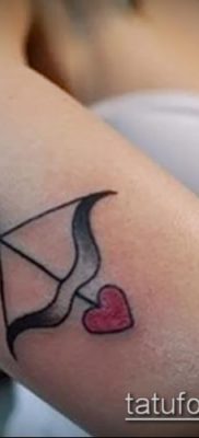 fotó Ámor tetoválásról (jelentése) - példa egy érdekes tetoválási rajzra - 062