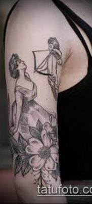 fotó Ámor tetoválásról (jelentése) - példa egy érdekes tetoválási tervre - 057