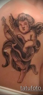 fotó Ámor tetoválásról (jelentése) - példa egy érdekes tetoválási rajzra - 054