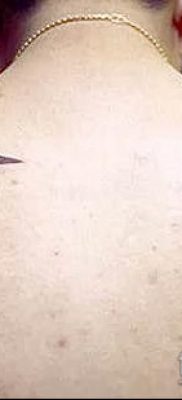 fotó Ámor tetoválásról (jelentése) - példa egy érdekes tetoválási rajzra - 050