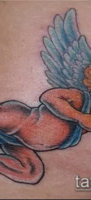 fotó Ámor tetoválásról (jelentése) - példa egy érdekes tetoválási rajzra - 041