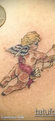 fotó Ámor tetoválásról (jelentése) - egy példa egy érdekes tetoválási tervre - 033