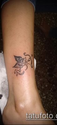 fotó Ámor tetoválásról (jelentése) - példa egy érdekes tetoválási tervre - 024