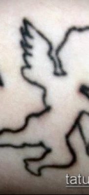 fotó Ámor tetoválásról (jelentése) - egy példa egy érdekes tetoválási tervre - 022