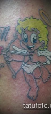 fotó Ámor tetoválásról (jelentése) - példa egy érdekes tetoválási rajzra - 010