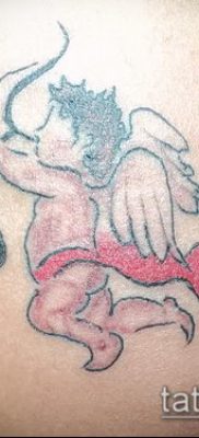 fotó Ámor tetoválásról (jelentése) - példa egy érdekes tetoválási rajzra - 003