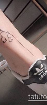 minimalista tetoválás № 850 - a minta méltó változata, amely sikeresen használható változtatásra és tetoválás minimalizmusként történő alkalmazására az alkaron