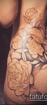 tetoválás a farokcsont fotóján (érték) - példa egy érdekes tetoválási rajzra - 043