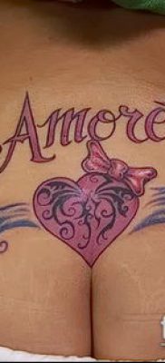 tetoválás a farokcsont fotóján (érték) - példa egy érdekes tetoválási rajzra - 034