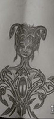 tetoválás a farokcsont fotóján (érték) - példa egy érdekes tetoválási rajzra - 020