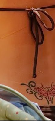 farokcsont tetoválás fotó (érték) - példa egy érdekes tetoválási rajzra - 001