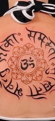 Fotó a tetoválásról OM 13