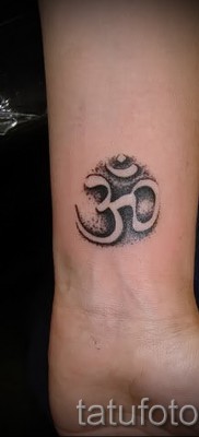 Fotó a tetoválásról OM 9