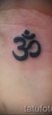 Fotó a tetoválásról OM 7