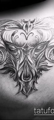 Kos tetoválás fotó (jelentése) - példa egy érdekes tetoválási rajzra - 044
