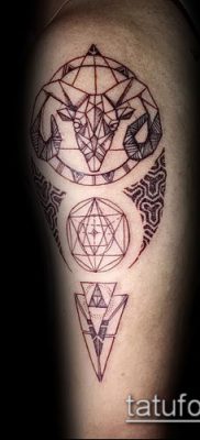 Kos tetoválás fotó (jelentése) - példa egy érdekes tetoválási rajzra - 037