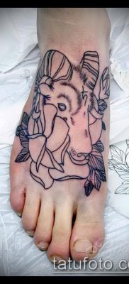 Kos tetoválás fotó (jelentése) - példa egy érdekes tetoválási rajzra - 031
