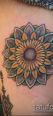 napraforgó tetoválás fotó (jelentése) - példa egy érdekes tetoválási tervre - 059