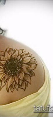 napraforgó tetoválás fotó (jelentése) - példa egy érdekes tetoválási rajzra - 026