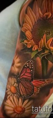 napraforgó tetoválás fotó (jelentése) - példa egy érdekes tetoválási rajzra - 006