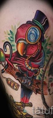 фото пример за татуировка на папагал за статия за значението на татуировка с папагал - 38