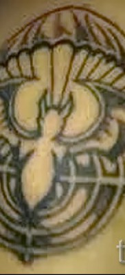 Fotó a tetováló látványról 7