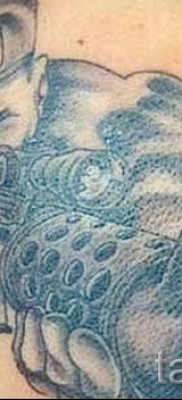 Fotó a tetováló látványról 6