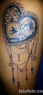 fotó a madár és ketrec tetoválásról, dátum: 2017.08.08. №038 - Tetovált madár és ketrec_