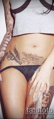 Fotó egy revolver tetoválásról (jelentése) - egy példa egy érdekes tetoválási rajzra - 057