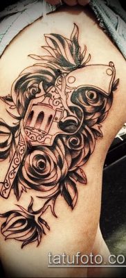 Fotó egy revolver tetoválásról (jelentése) - egy példa egy érdekes tetoválási rajzra - 053