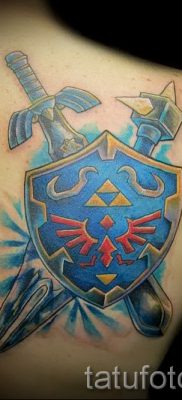 A pajzs és a kard menő tetoválásának ötlete a karddal készült pajzs tetoválás történetéről