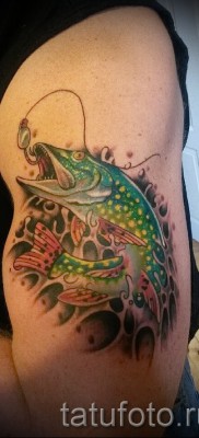 Снимка на татуировка на щука - татуировка на ръка и рамо