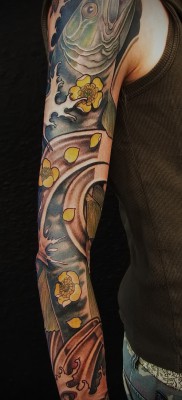 Снимка на татуировка на щука - татуировка с пълна ръка