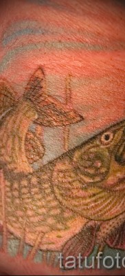 Снимка на татуировка на щука - опция на ръката